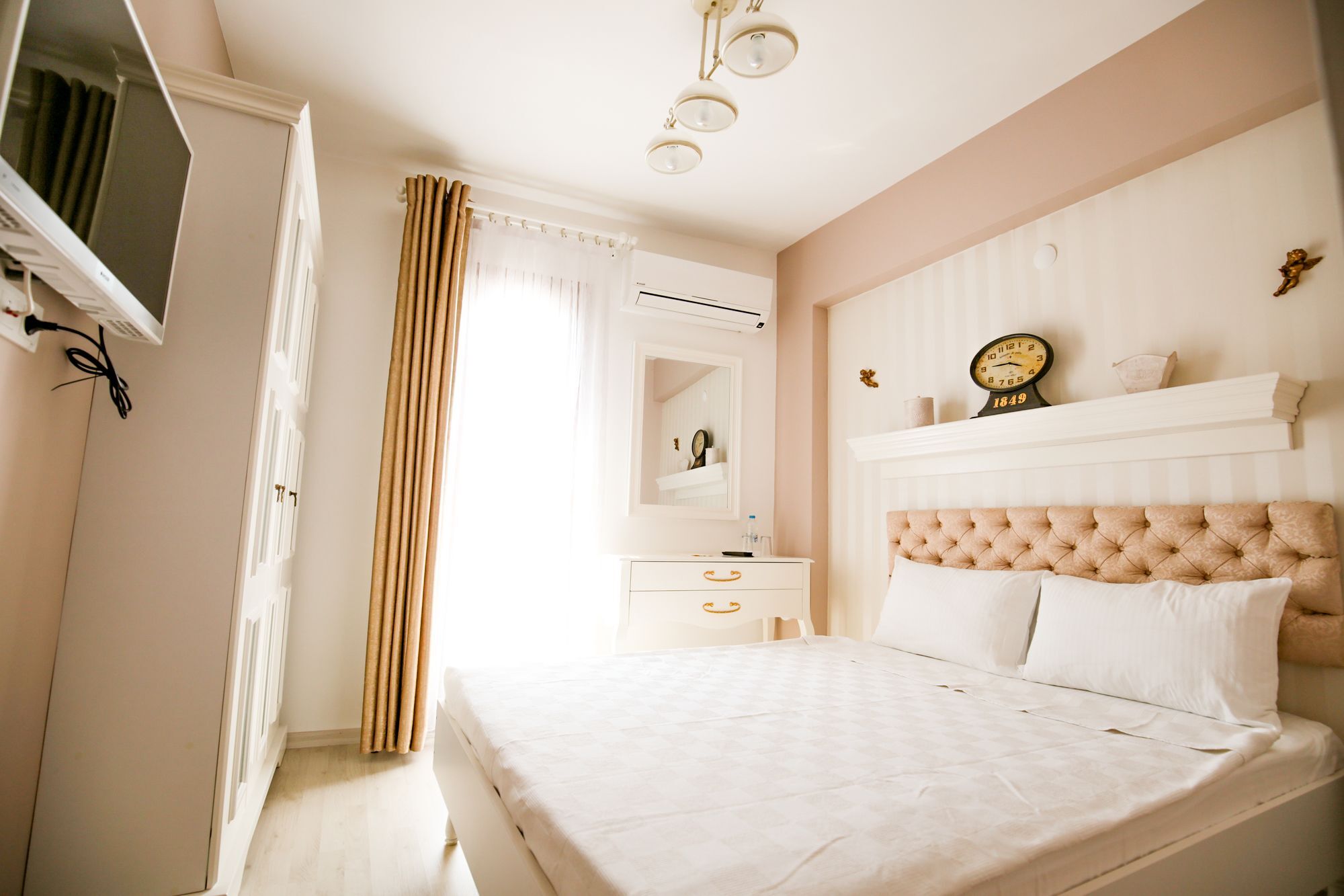Menendi Otel Foça Esterno foto
